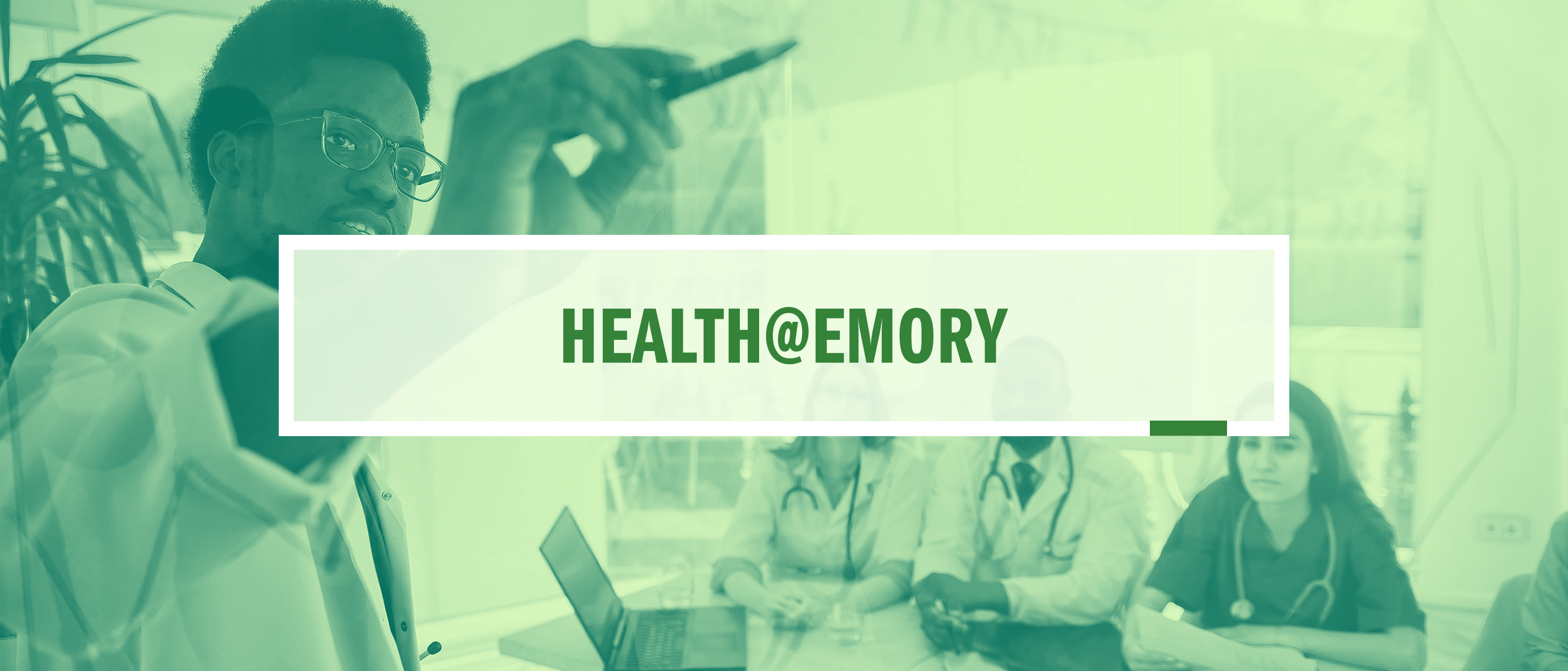 A pale-green image of a meeting in which an African American man at left is gesturing with a pencil to an audience of male and female health care workers of several ethnicities. Surmounted by a semi-opaque white box containing the words "Health @Emory"